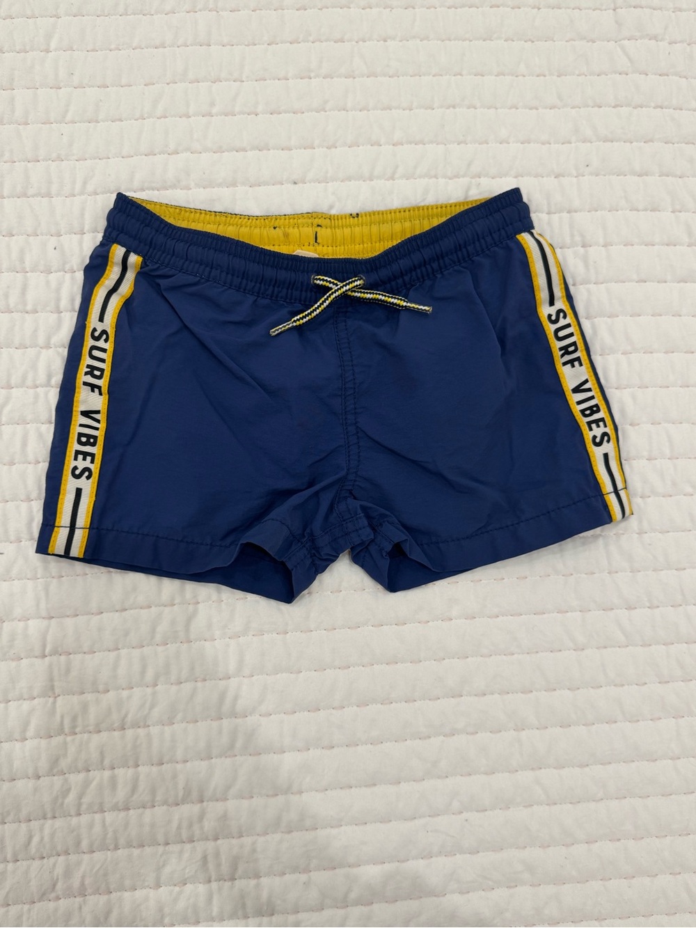 Zara Navy Swim Trunks with Yellow Trim and 'Surf Vibes'